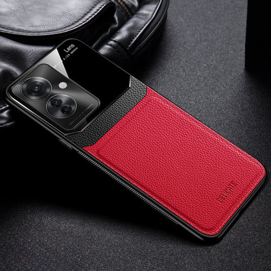 A red and black Oppo F25 Pro 5G Premium Leather Lens Protective Case for a smartphone, displayed on a surface with a leather bag in the background.